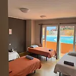 Banama Surfhouse - Coliving Coworking & Yoga 게스트하우스 코라레호